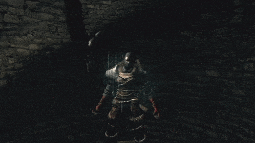 a person is holding a sword in a dark tunnel .