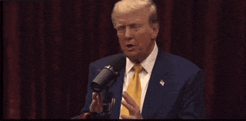 donald trump speaking into a microphone with the words he goes he 's a stupid son of a bitch written in yellow