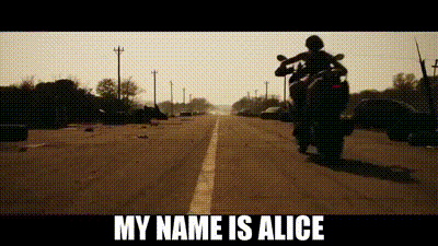 a person is riding a motorcycle down a road with the caption `` my name is alice '' .