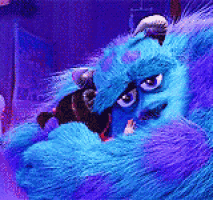 a close up of a blue monster from monsters inc