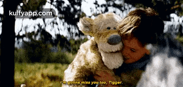 a boy is hugging a teddy bear and says i 'm gonna miss you too
