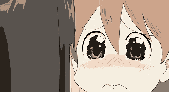 a close up of a cartoon character 's face with tears running down her face .