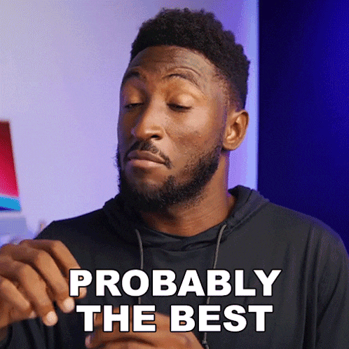 a man with a beard says probably the best with his eyes closed