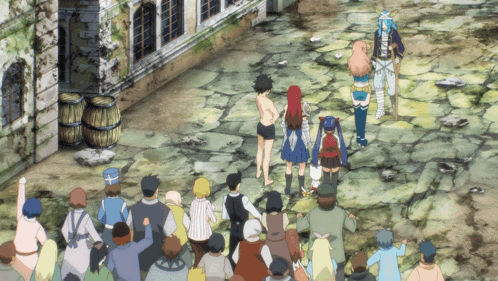 a group of people standing in front of a stone wall