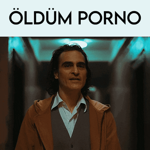 a man in a brown coat is standing in a hallway with the words " oldum porno " above him