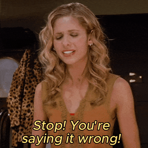 a woman says " stop you 're saying it wrong " in yellow letters
