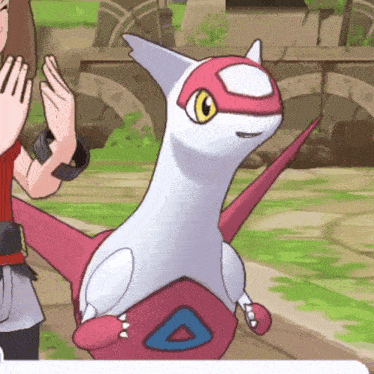 a pokemon with a triangle on its back is being held by a girl