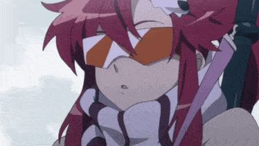 a girl with red hair and a scarf around her neck