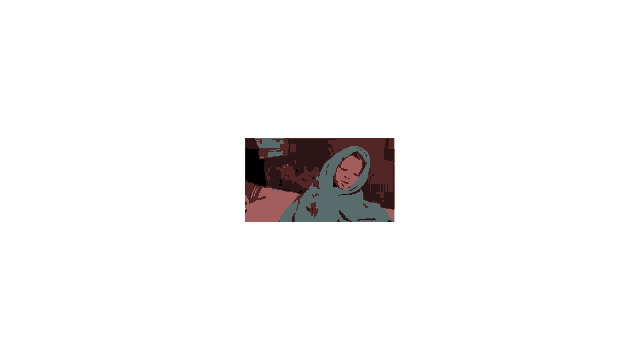 a baby wrapped in a blue blanket is laying on a bed