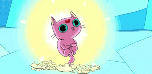 a pink cat with green eyes and a heart on its face