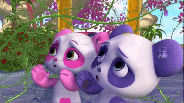 two pink and purple panda bears are standing next to each other with flowers in the background