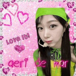 a girl wearing a green headband with the words love it written on it