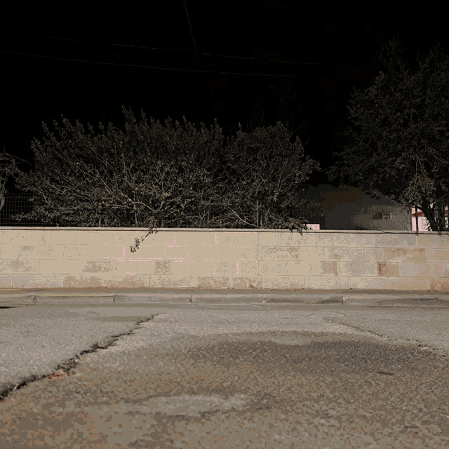a brick wall with a sign on it that says ' a '