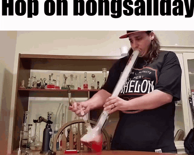 a man smoking a bong with the words hop on bongsallday above him