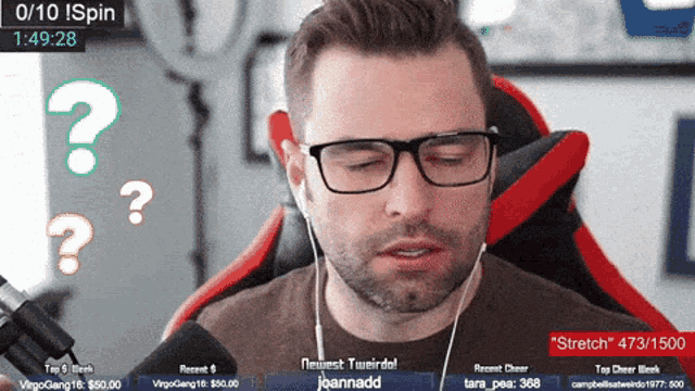 a man wearing glasses and earbuds is playing a video game with a time of 1 : 49.28