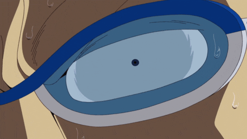 a close up of a man 's face with glasses
