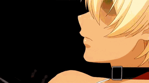 a close up of a person eating something with a buckle around their neck