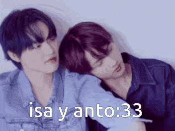 a couple of men laying next to each other with the words isa y anto : 33 above them