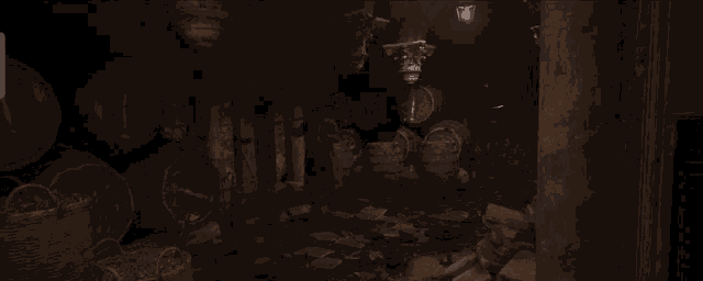 a dark room with pillars and a light on the ceiling