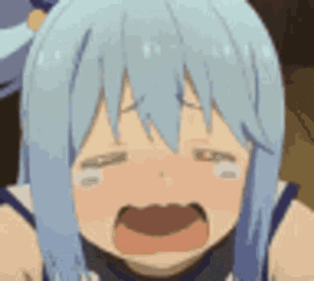 a close up of a cartoon girl crying with her mouth open .