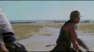a blurry picture of a man riding a horse