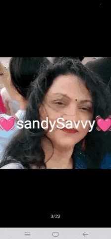 a close up of a woman 's face with the words sandy savvy written on it .