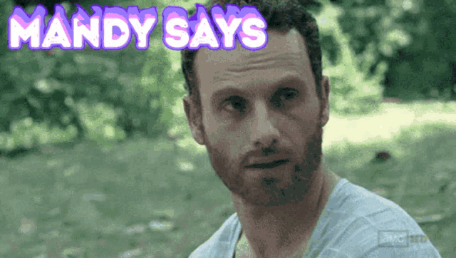 a man with a beard and the words mandy says behind him