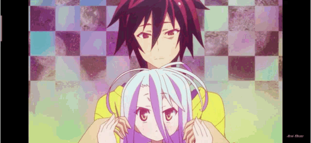a man and a girl are standing next to each other with a checkered background in the background