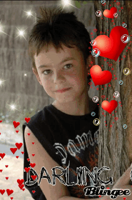 a picture of a young boy with darling blingee written on the bottom