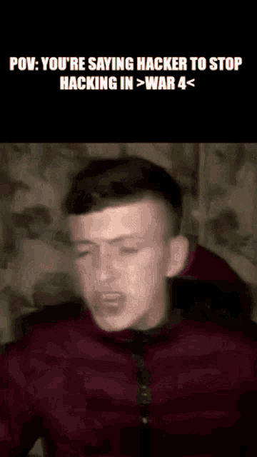 a man in a red jacket is making a funny face while talking about hacking in war 4 .