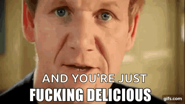 a close up of a man 's face with the words and you 're just fucking delicious above him