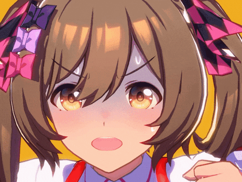 a close up of a girl 's face with a surprised expression