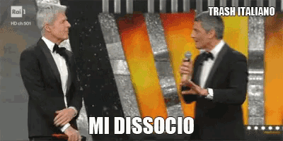 two men in tuxedos are standing next to each other with trash italiano written in the corner