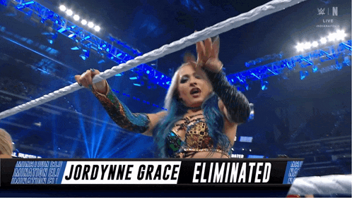 a woman in a wrestling ring with the words jordyne grace eliminated