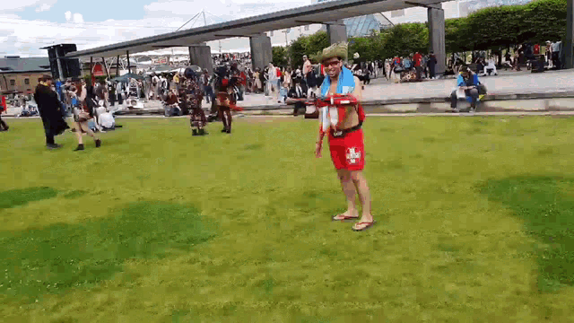 a man in a red shorts with the word pirate on them