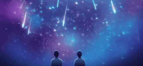 two men are looking up at a starry night sky with falling stars