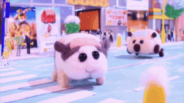 two stuffed animals are walking down a street in front of a sign that says cafe