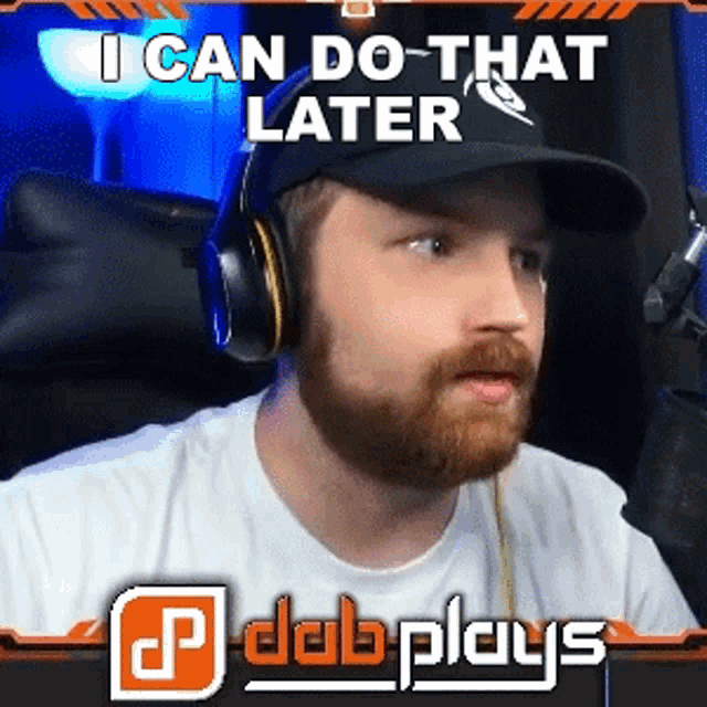 a man with a beard wearing headphones and a hat with the words " i can do that later "
