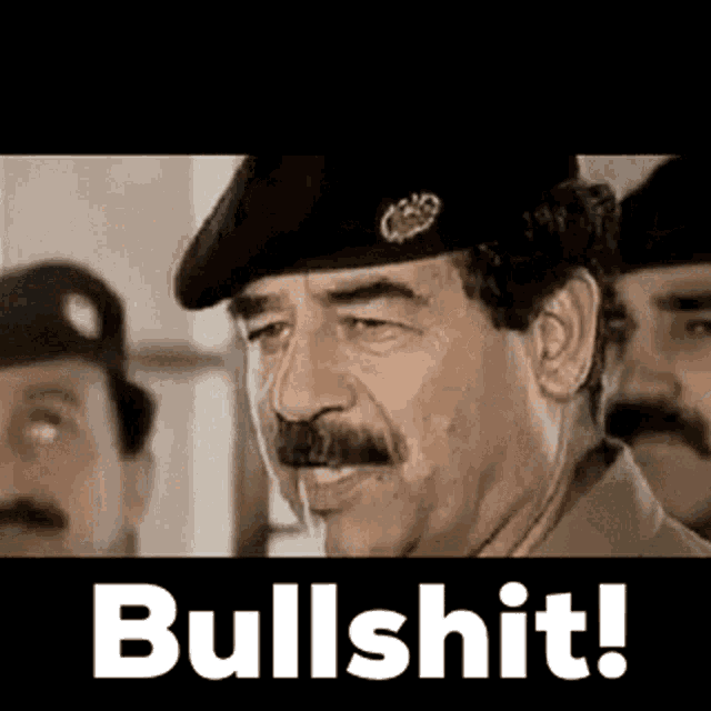 a man with a mustache and a beret is standing in front of a group of men and says `` bullshit ! ''