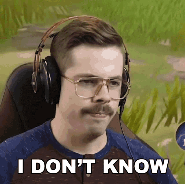 a man wearing headphones and glasses says i don 't know