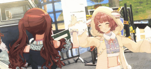 two anime girls giving each other a high five in front of a caution sign