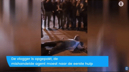 a man is laying on the ground in front of a crowd of people with a caption that says ' de vlogger is opgepakt '