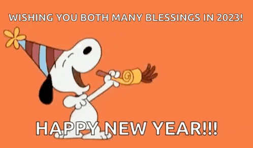 snoopy is blowing a party horn and wishing you both many blessings in 2022 .