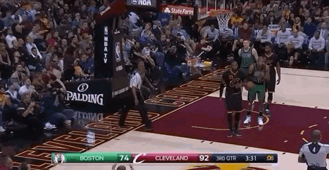 a basketball game between the boston celtics and the cleveland cavaliers is underway
