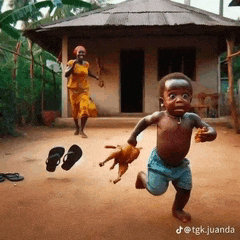 a little boy is running with a stuffed animal in his hand in front of a house