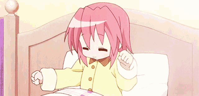 a girl with pink hair is yawning while laying in bed
