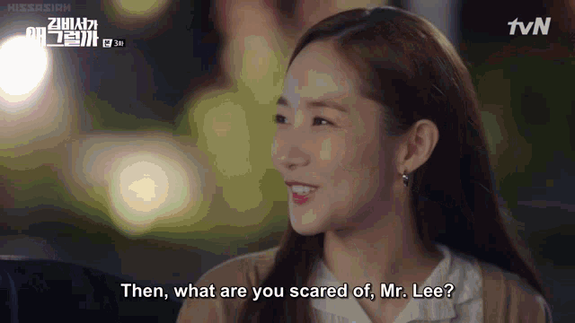 a woman is talking to a man and says then what are you scared of mr. lee ?