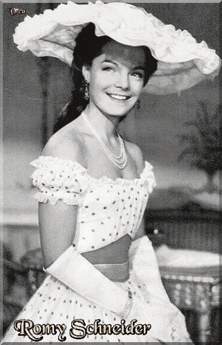 a black and white photo of a woman wearing a hat and gloves with the name romy schneider on the bottom