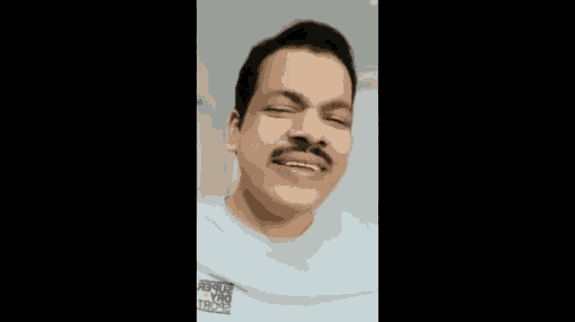 a man with a mustache is wearing a white shirt that says abercrombie and fitch