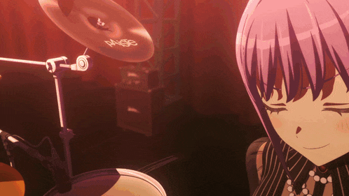 a girl with purple hair playing drums with a paiste cymbal in the background